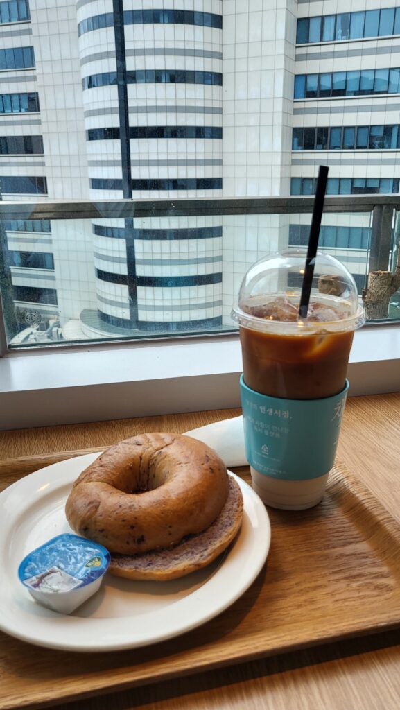 Blueberry bagel and cafe latte at Hangang view cafe in Mapo