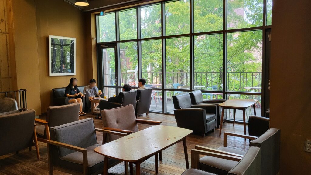 Cafe Alver in Gangnam second floor seating with greenery view