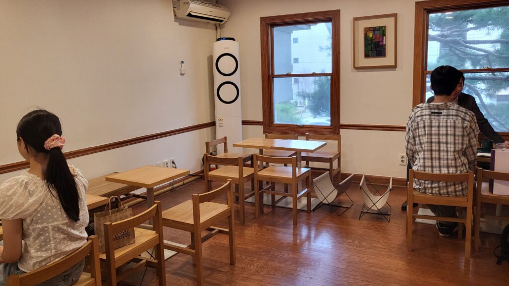 Second floor interior of minimalist cafe near Samseong Station