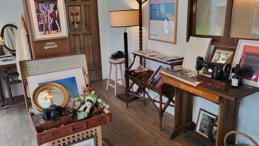 Cozy vintage interior with books and paintings
