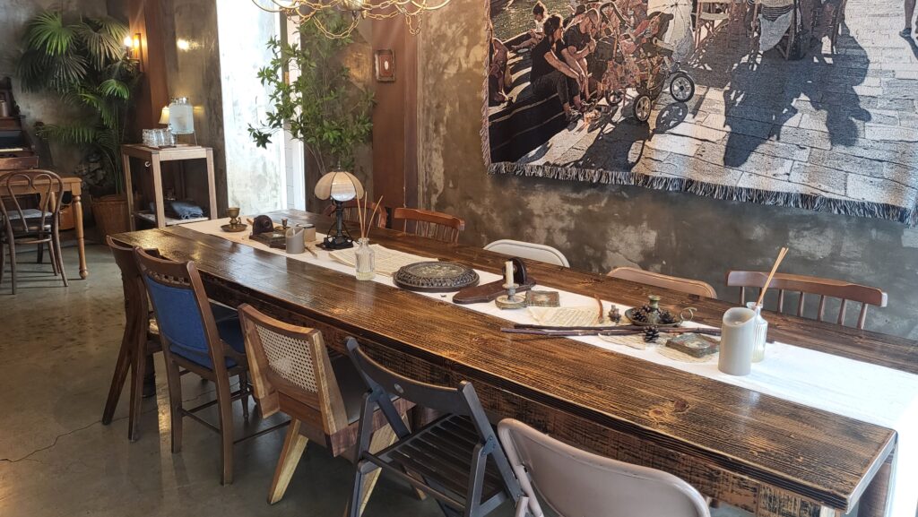 Cozy seating on the second floor of European cafe near me Cafe Armoire