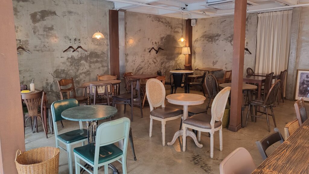 Cozy seating on the second floor of European cafe near me Cafe Armoire