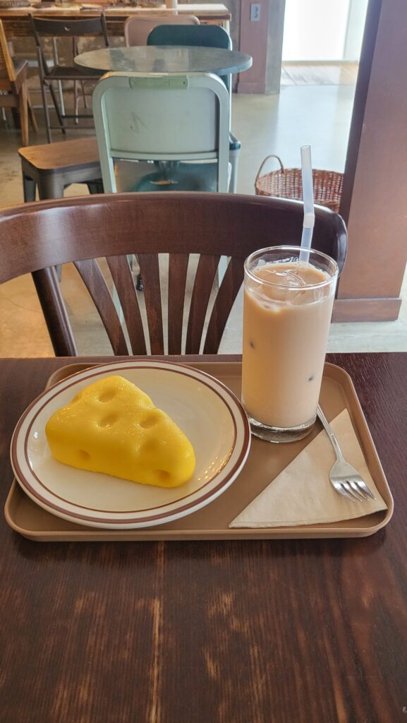 Peach black milk tea and Cheesecake dessert at European cafe near me near Konkuk University Station