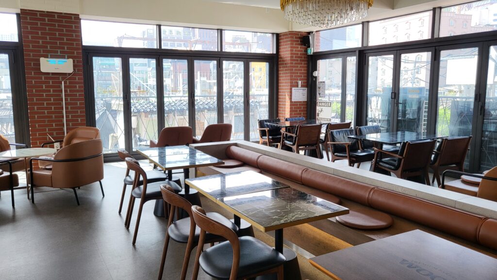 Cozy seating area inside Ikseon-dong hanok cafe Wooz Bakery