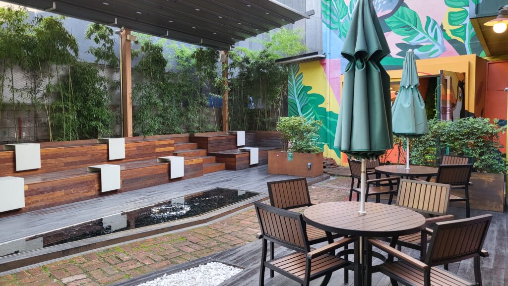 outdoor seating with animal mural walls