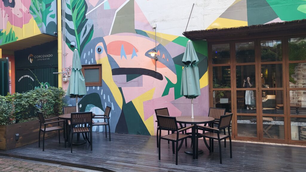 outdoor seating with animal mural walls