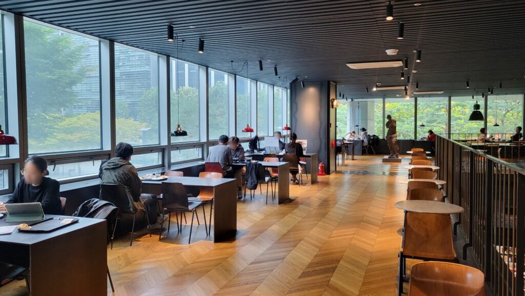 Window seat at Terarosa POSCO Book Cafe with power outlet for laptop