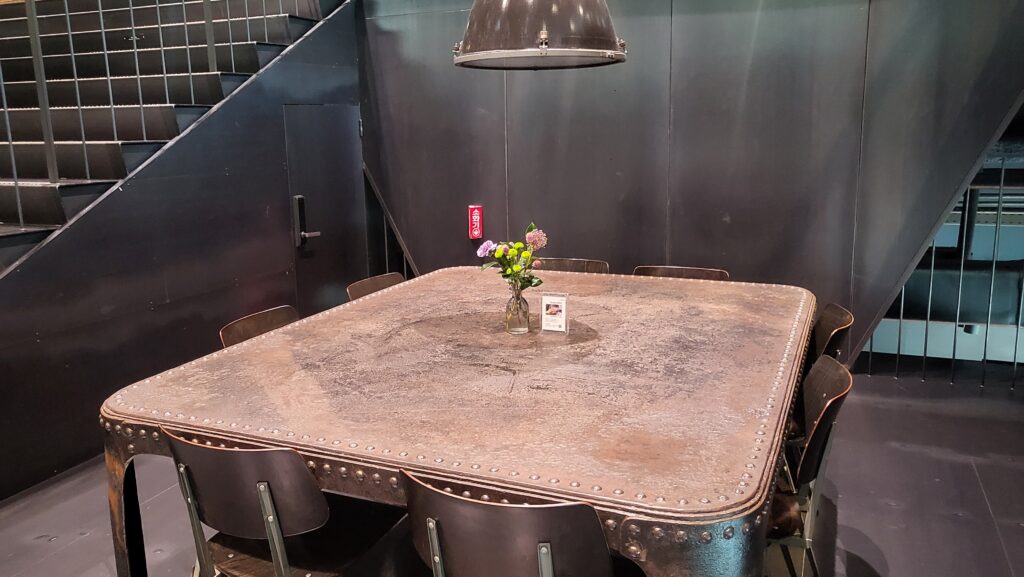 group seat halfway on the stairs