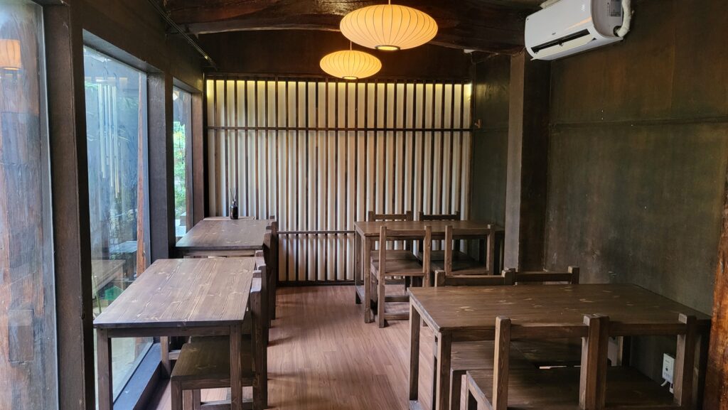 Nature-inspired Jongno aesthetic cafe indoor seating with wooden tables