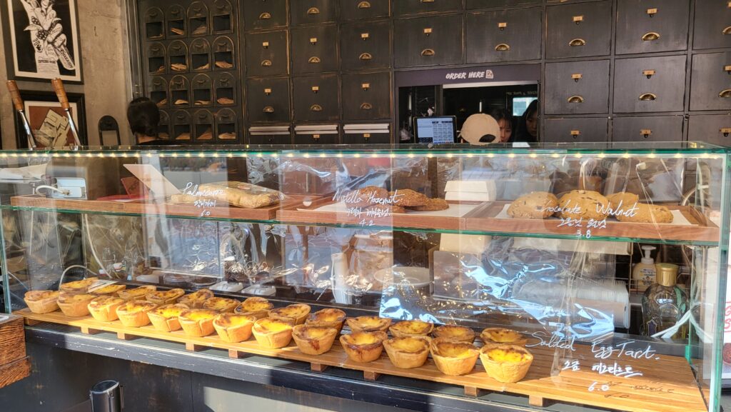 egg tarts, cookies and financiers displayed