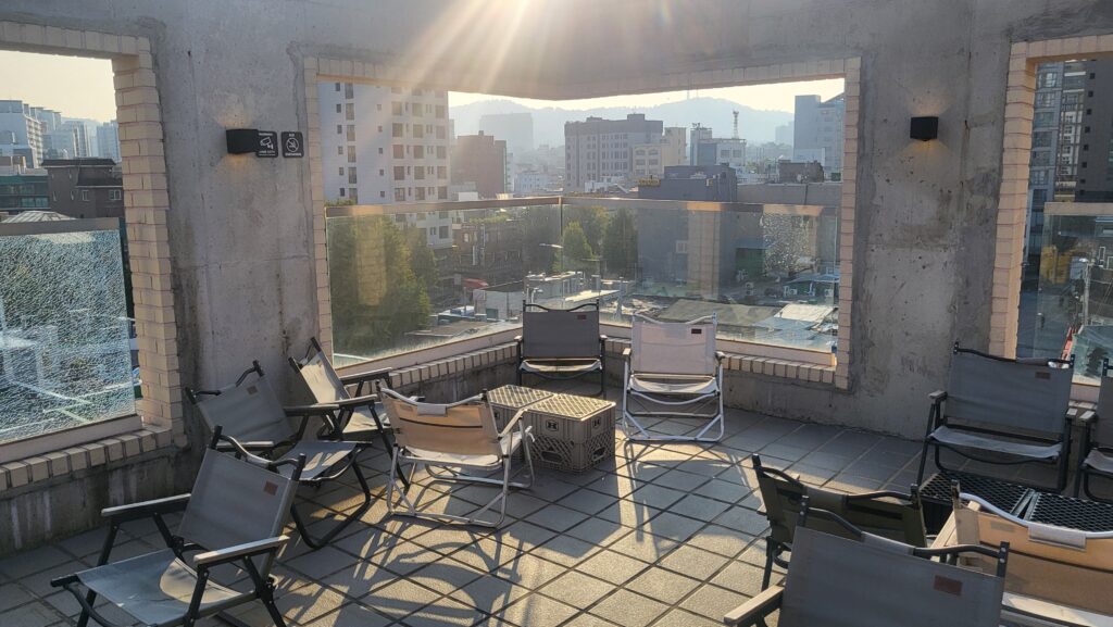 Mailroom Sindang Cafe rooftop with Namsan Tower Seoul view and low camping-style chairs